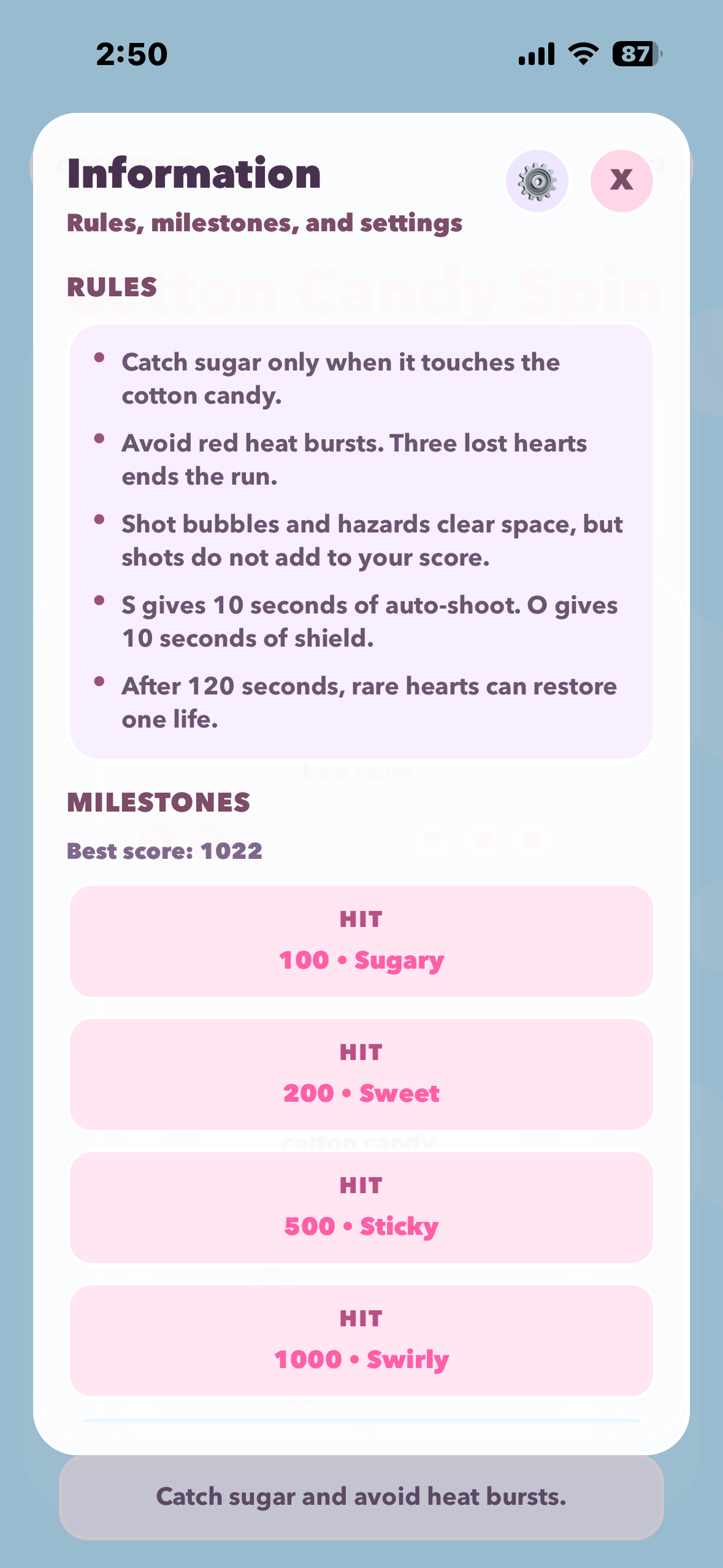 Cotton Candy Spin information screen showing game rules and score milestones.